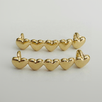 Gold Five Heartbeats Charm